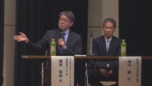 写真22. 座長の堀田先生(左)と津川教授